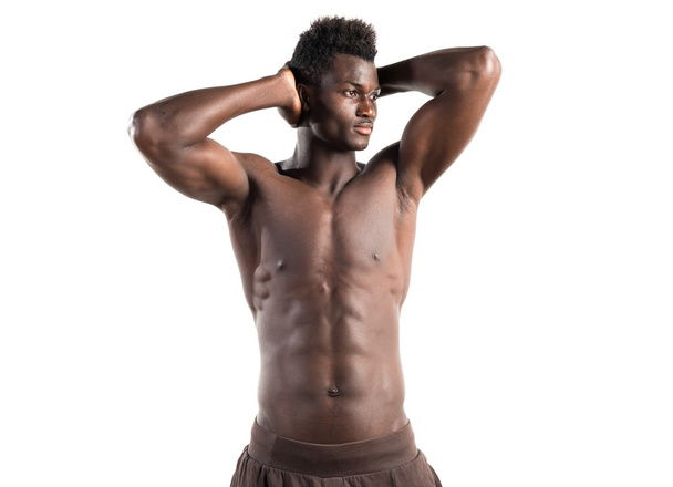 Forte homem negro posando em estúdio
 - Foto, Imagem