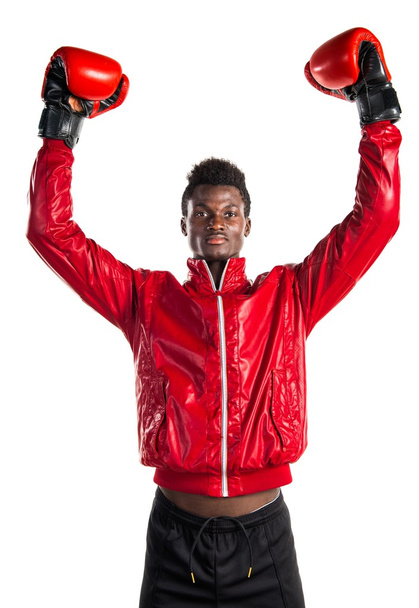 Black man with boxing gloves - Foto, imagen