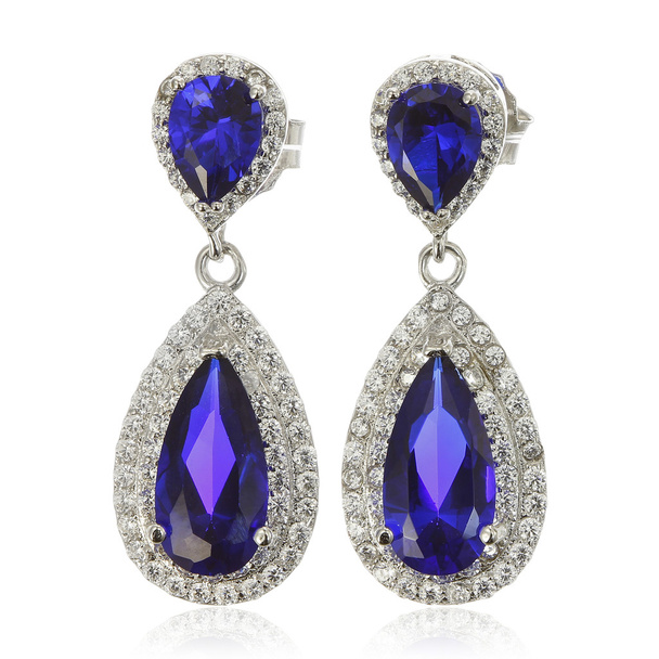 Silver earrings with sapphire isolated on white - Photo, Image