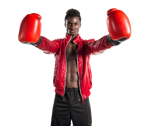 Чёрный мужчина в боксёрских перчатках
 - Фото, изображение