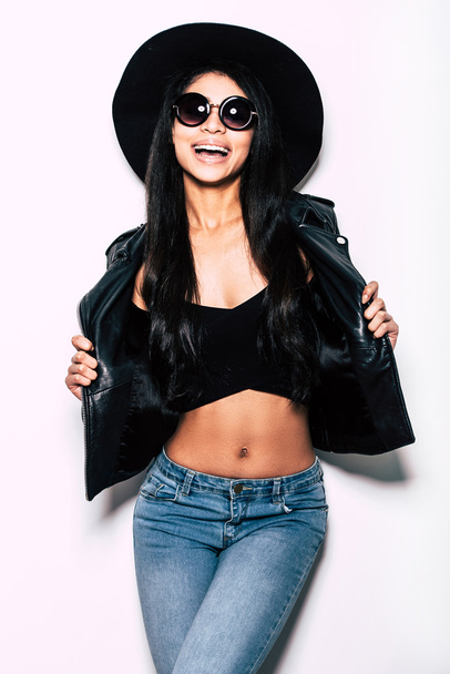 Beautiful woman in leather jacket and hat  - 写真・画像