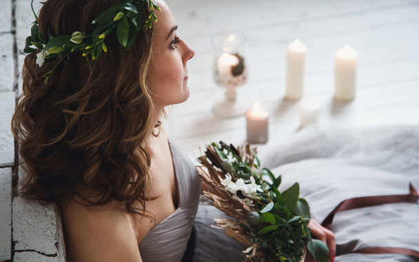 Beautiful tender bride holding creative wedding bouquet over green ecological style decor - Φωτογραφία, εικόνα