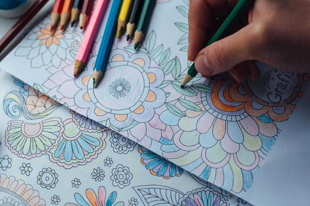 Image of woman coloring, adult coloring book trend, for stress r - Photo, Image