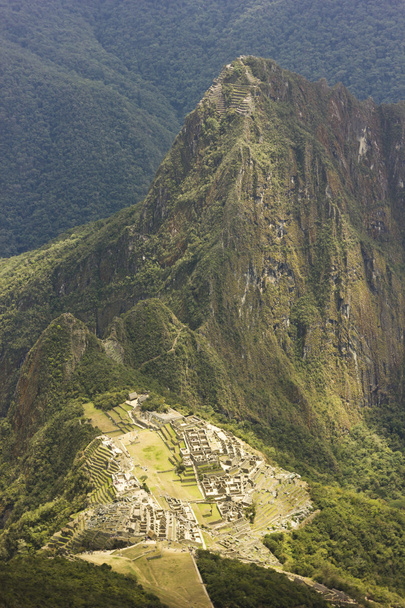 old town machu-picchu,peru, with surrounding mountains and clouds - Fotoğraf, Görsel