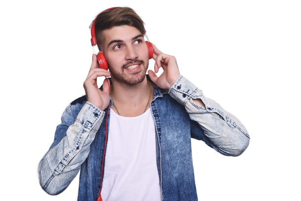Young handsome man listening to music  - Foto, afbeelding