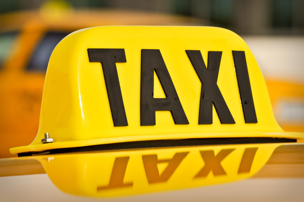 Yellow and Black Taxi Cab Car Sign - Valokuva, kuva