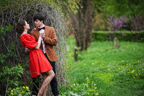 Couple hugging in love background dry branches at field. Stylish - Foto, Imagen