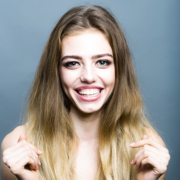 Smiling young blonde girl - Φωτογραφία, εικόνα