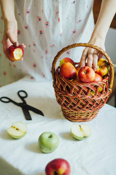 Apples  on white table. Sweet apples on table on bright backgrou - Valokuva, kuva
