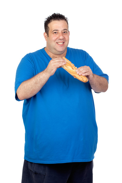 Happy fat man with a large bread - Photo, Image