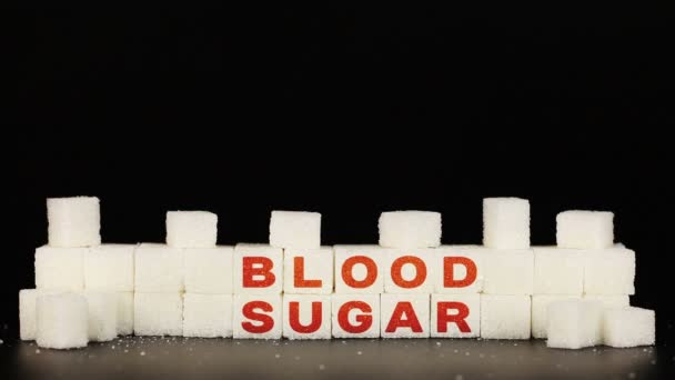 マンの手置く砂糖キューブには碑文単語血糖値 - 映像、動画