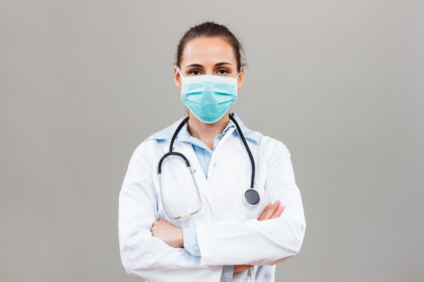 female doctor with protective mask - Foto, afbeelding