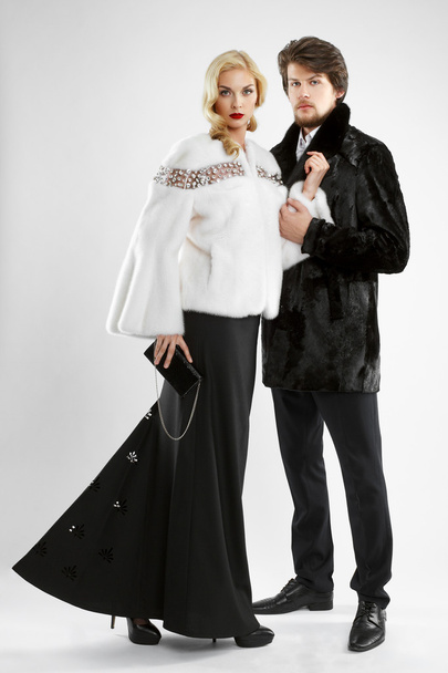 stylish man and glamour woman in fur coat posing - Photo, Image
