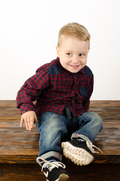 happy little boy play in studio - Фото, изображение