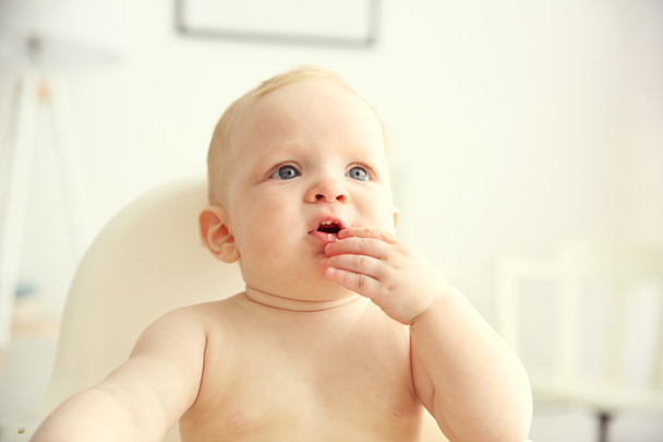 Baby boy eating - Фото, зображення