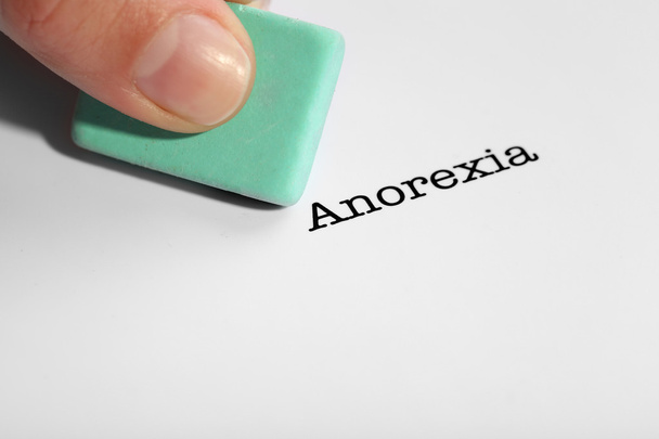 Anorexia word with eraser  - Foto, imagen