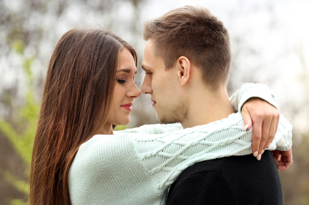 Young couple hugging   - 写真・画像