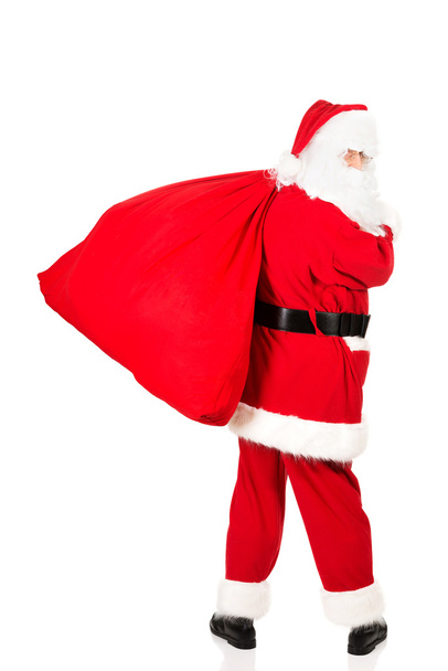 Фото счастливого Санта-Клауса в очках
 - Фото, изображение