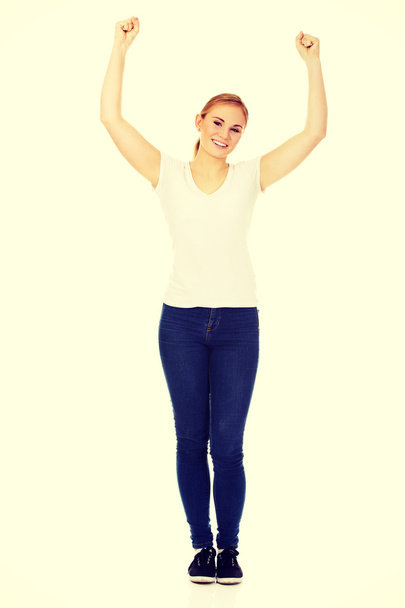 Young happy woman with arms up - Zdjęcie, obraz