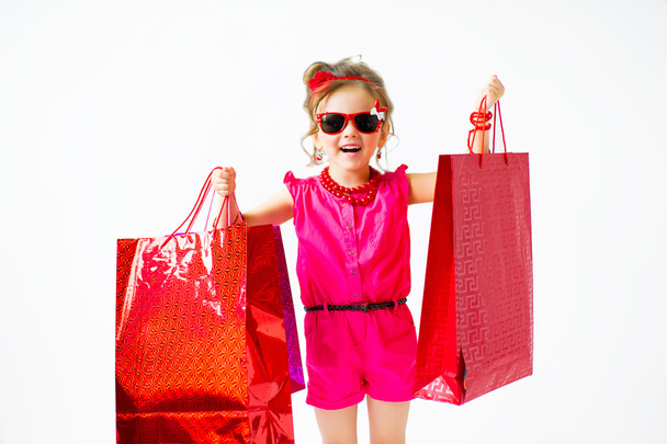 little girl with shopping - Фото, зображення