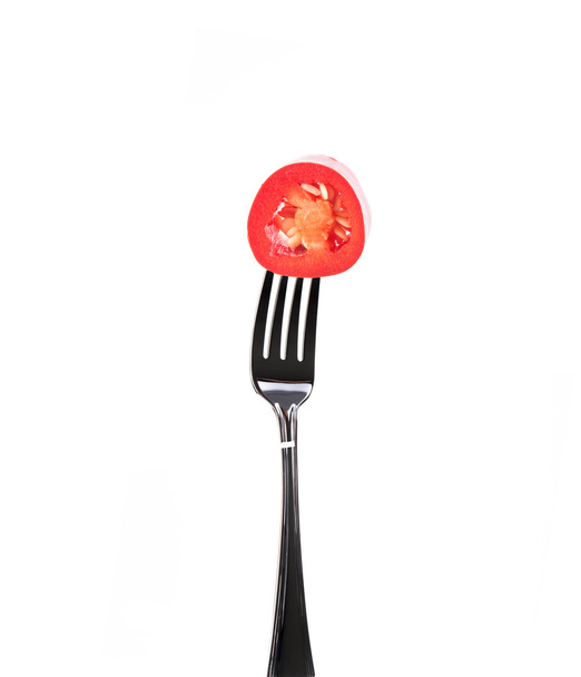 Red hot chili pepper on fork isolated on white - Photo, Image