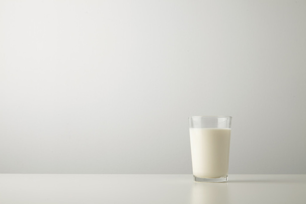 glass with fresh organic milk  - Foto, imagen