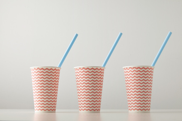 paper cups decorated with red lines - Φωτογραφία, εικόνα