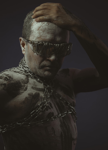 Man with metal chains  - Foto, Bild