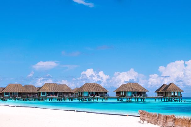 Beach with water bungalows at Maldives. - Photo, Image