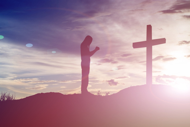 woman pray with cross silhouette, god concept - Photo, Image
