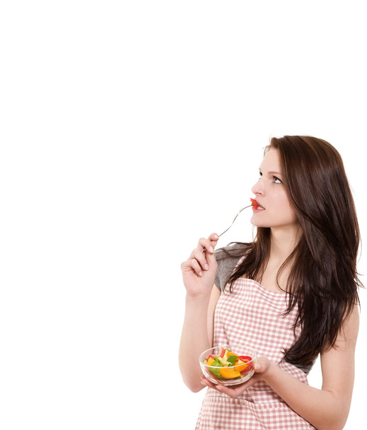 Young woman eating salad - Foto, Imagen