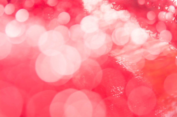 Red bokeh holiday textured Christmas decorations background - Photo, Image