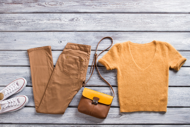Brown pants and t-shirt. - Фото, изображение