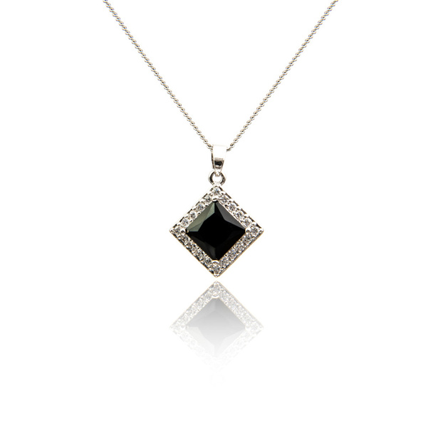 Black spinel Diamond pendant isolated on white - Valokuva, kuva