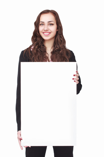 happy woman holding white blank paper - Foto, afbeelding