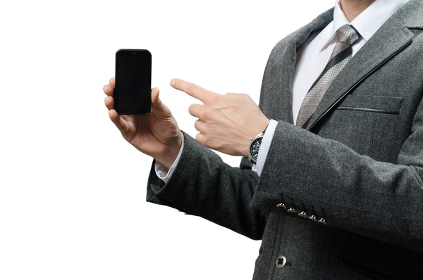 businessman in a suit with gadget - Zdjęcie, obraz