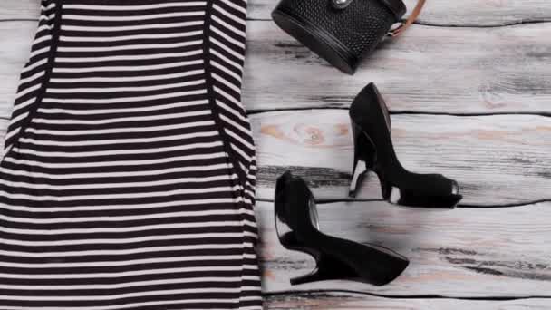 Striped dress with short sleeves. - Footage, Video