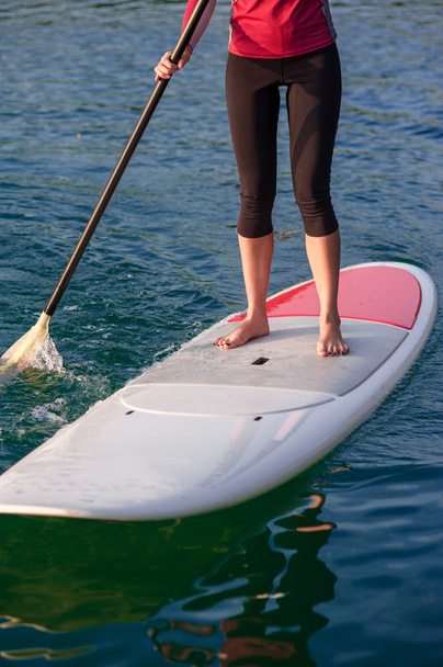 legs woman practicing paddle11 - 写真・画像