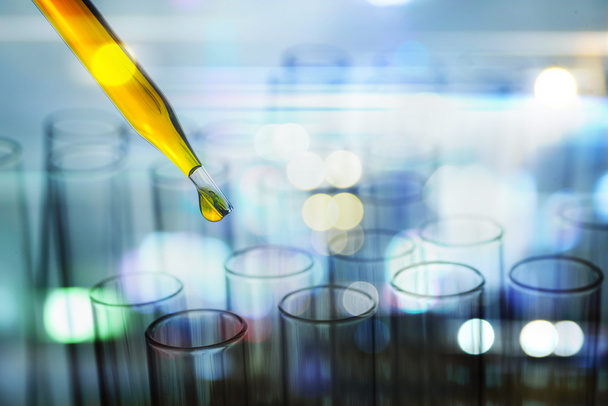 double exposure of science laboratory test tubes with bokeh - Photo, Image