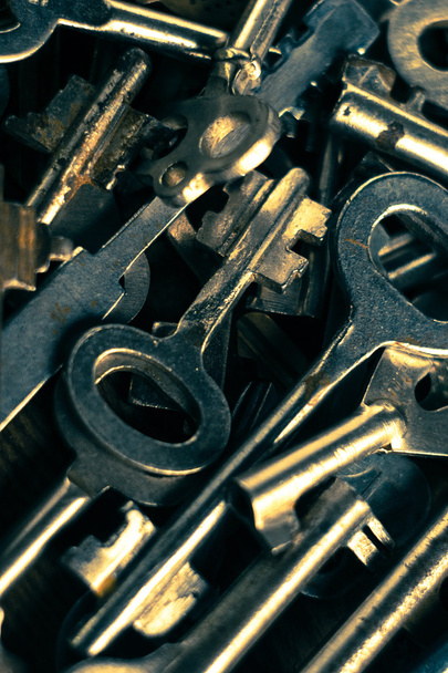 Set of keys on wood background. Tight focus with blur background - Foto, imagen