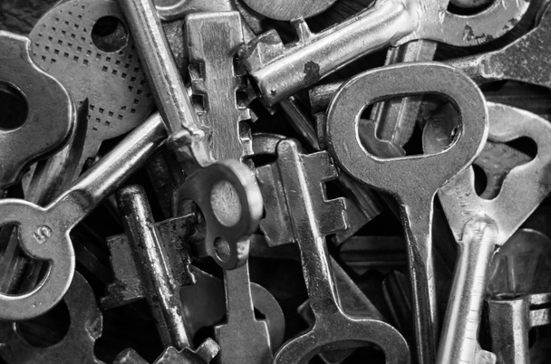 Set of keys on wood background. Tight focus with blur background - Zdjęcie, obraz