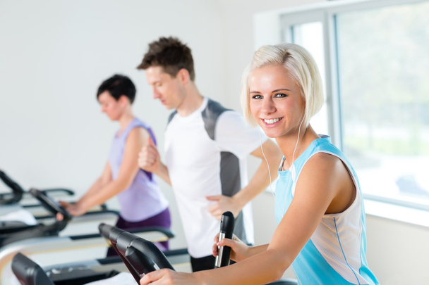 Fitness young on treadmill running exercise - Foto, Bild