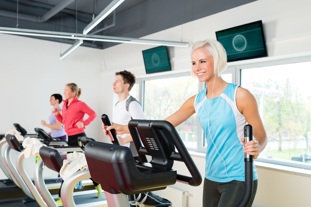 Young on fitness treadmill running exercise - Foto, Bild