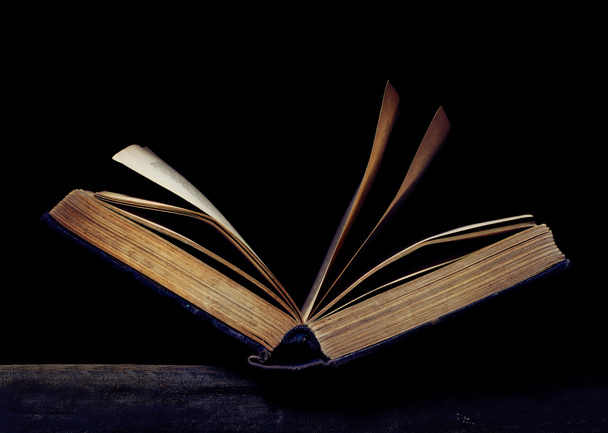 Open book on the black background - Photo, Image