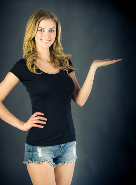 Woman presenting copy space with hand - Photo, image