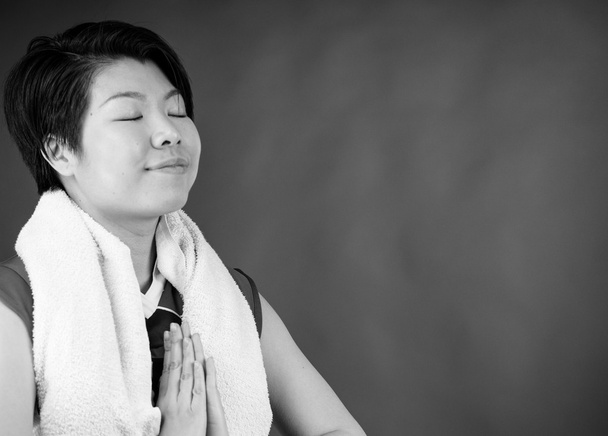 Nainen rukoilee ja toivoo
 - Valokuva, kuva
