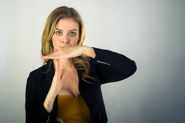 Woman gesturing break sign - Photo, Image