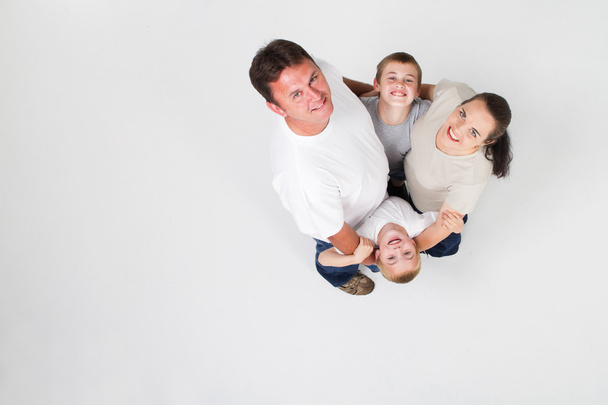 Happy and loving family of four - Fotoğraf, Görsel