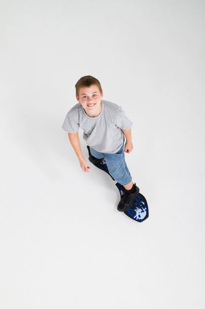 Teen boy skateboarding - Foto, Imagen