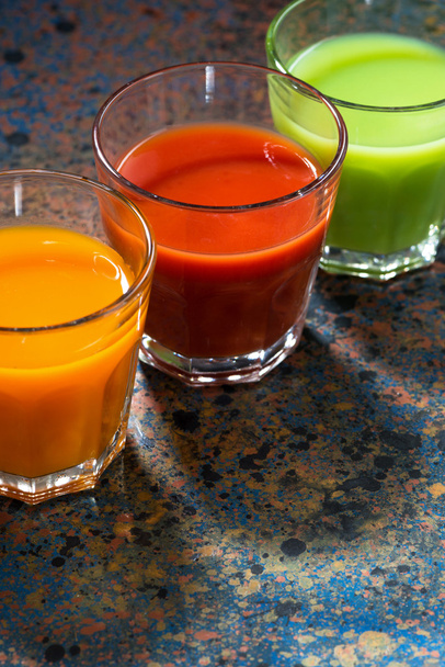 vegetable juices in glass beakers, top view - Photo, Image